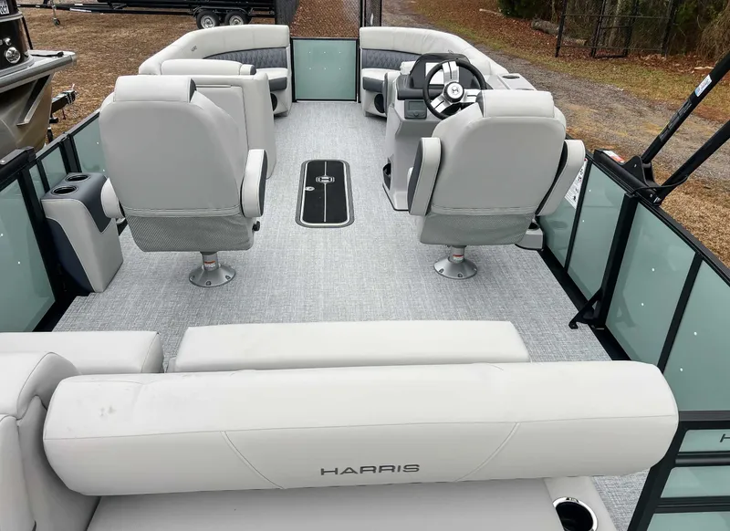 Slide: The Image of Interior of 2026 Harris Cruiser 230 SLDH with gray seating. - 11