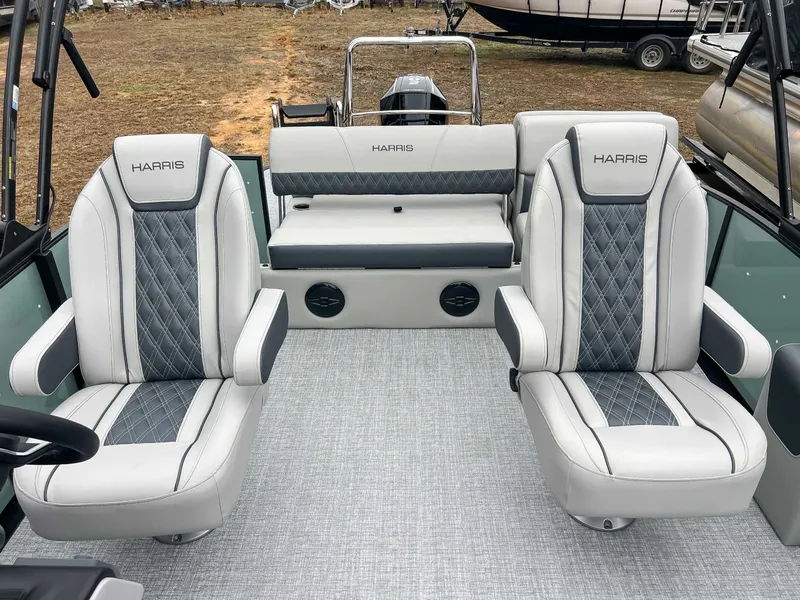 Slide: The Image of Interior of 2026 Harris Cruiser 230 SLDH with luxurious seating. - 16