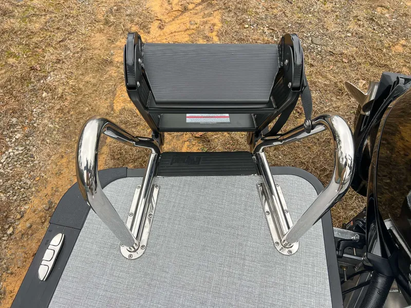 Slide: The Image of Boarding ladder of 2026 Harris Cruiser 230 SLDH on gray deck. - 22