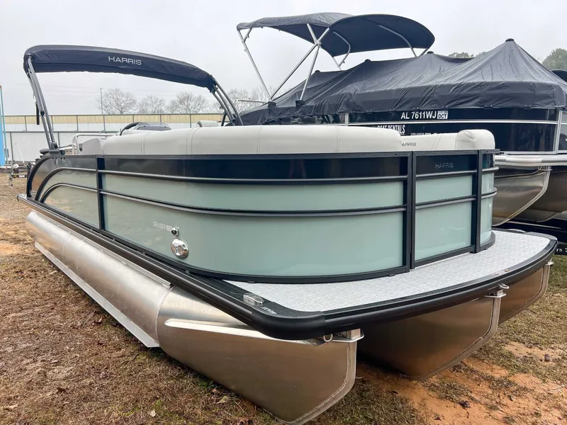 Slide: The Image of 2026 Harris Cruiser 230 SLDH pontoon boat on dry land. - 3
