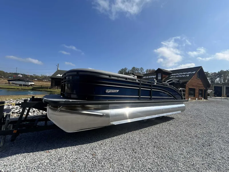 Slide: The Image of 2026 Harris Solstice 230 SLDH pontoon boat on trailer outdoors. - 3