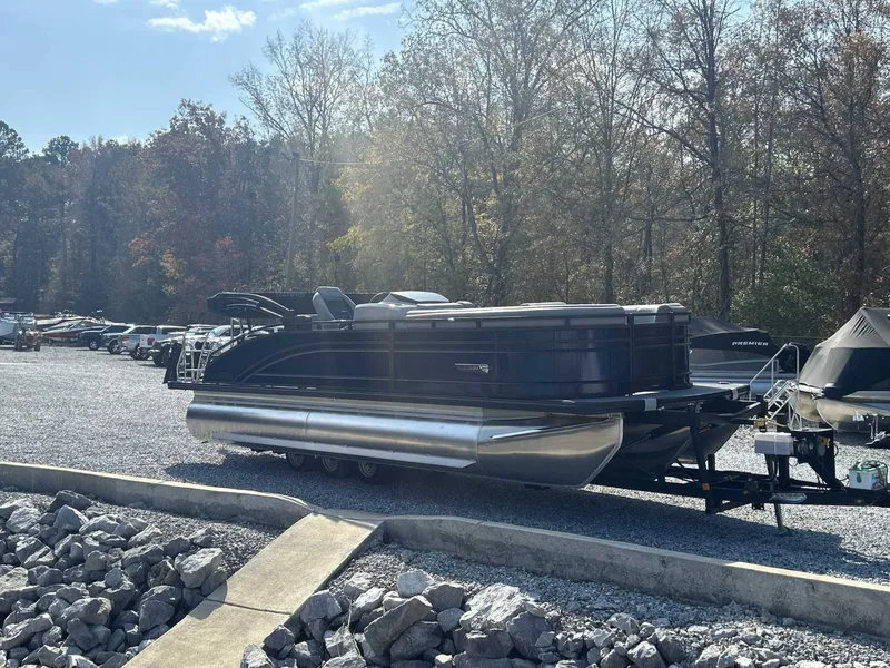 Slide: The Image of 2026 Harris Solstice 230 SLDH pontoon boat on gravel lot. - 5