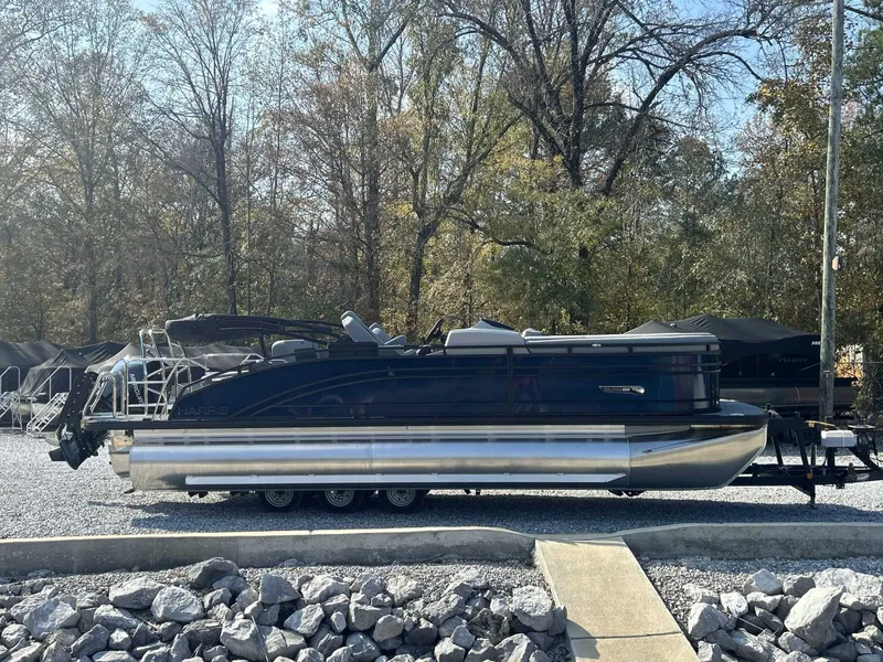 Slide: The Image of 2026 Harris Solstice 230 SLDH pontoon boat on trailer outdoors. - 6