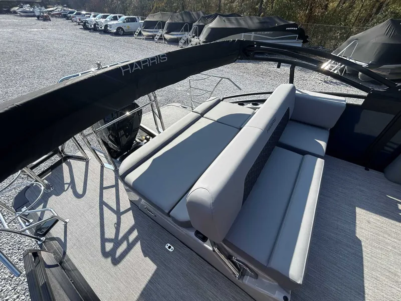 Slide: The Image of 2026 Harris Solstice 230 SLDH with gray outdoor seating. - 8
