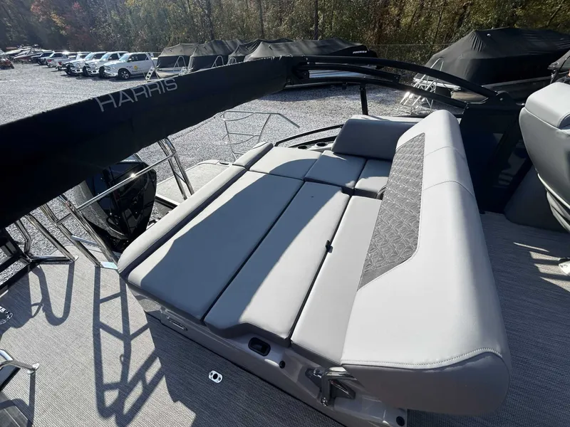 Slide: The Image of Harris Solstice 230 SLDH 2026 with gray cushioned seating outdoors. - 9