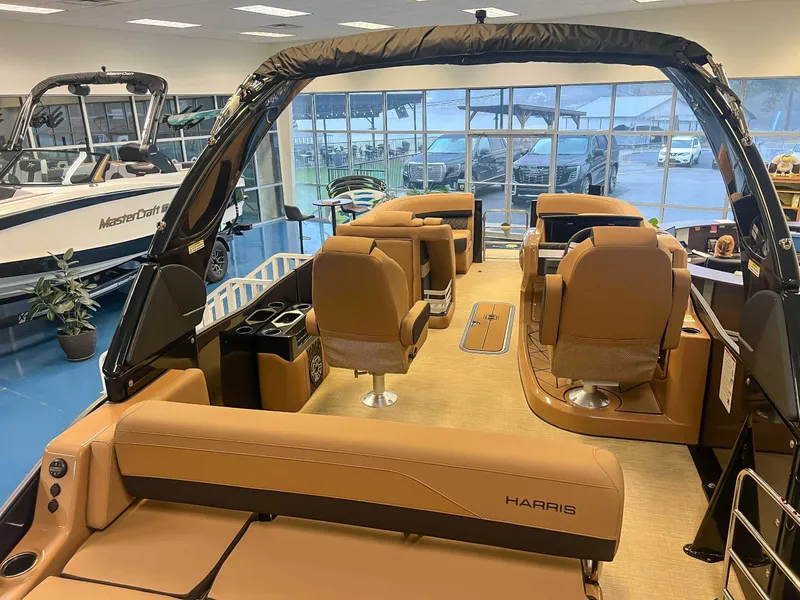 Slide: The Image of Interior of 2026 Harris Grand Mariner 230 SLDH with luxurious seating. - 10