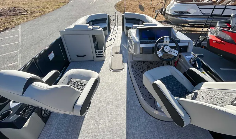 Slide: The Image of Interior of 2026 Harris Grand Mariner 230 SLDH with luxurious seating. - 11