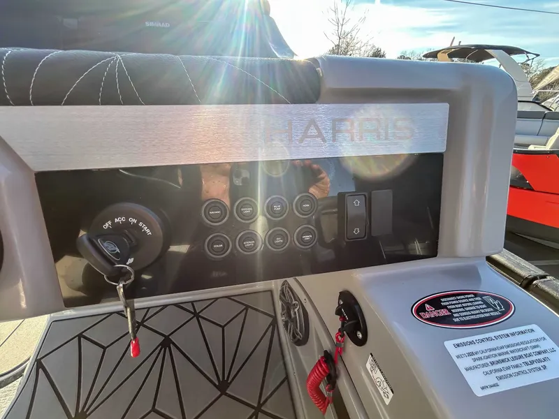 Slide: The Image of Dashboard of Harris Grand Mariner 230 SLDH 2026 with key switch. - 19