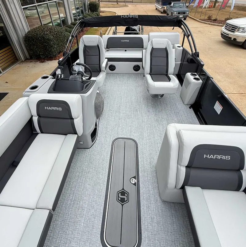 Slide: The Image of Interior of 2026 Harris Cruiser 250 SLDH with gray seating. - 12