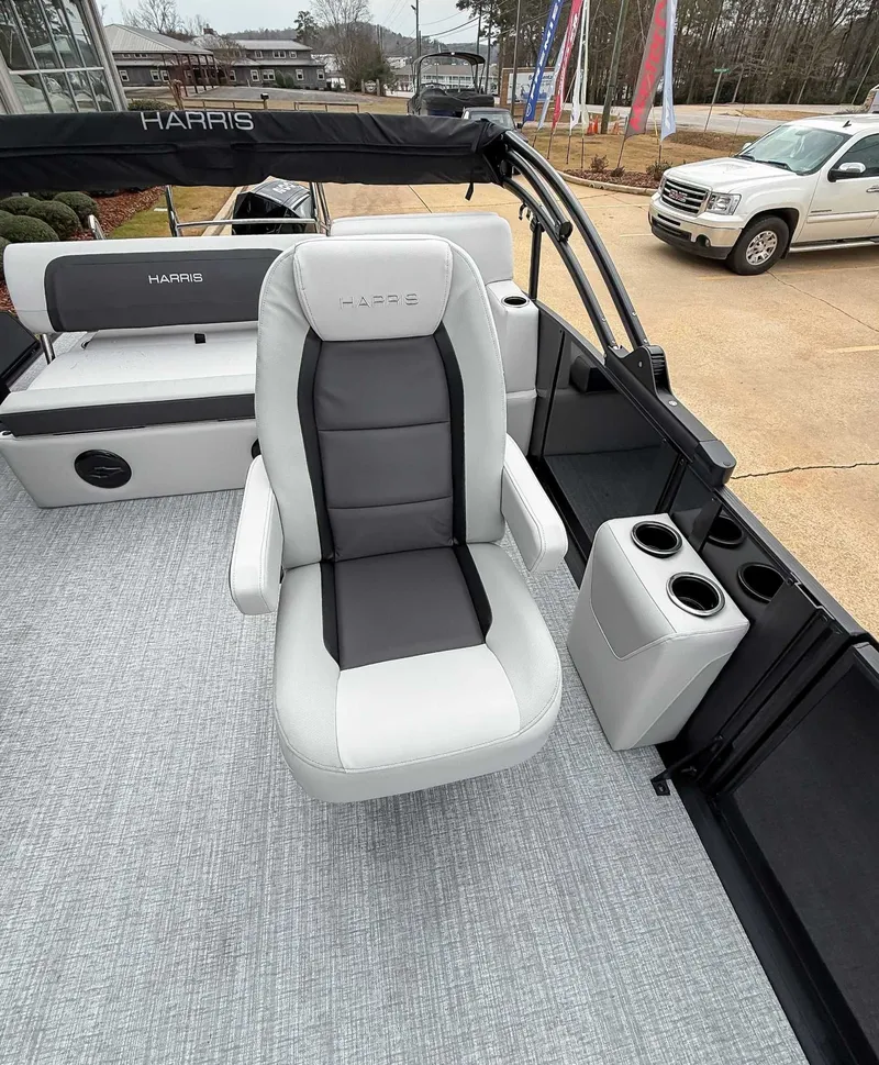 Slide: The Image of Interior of 2026 Harris Cruiser 250 SLDH with luxurious seating. - 13