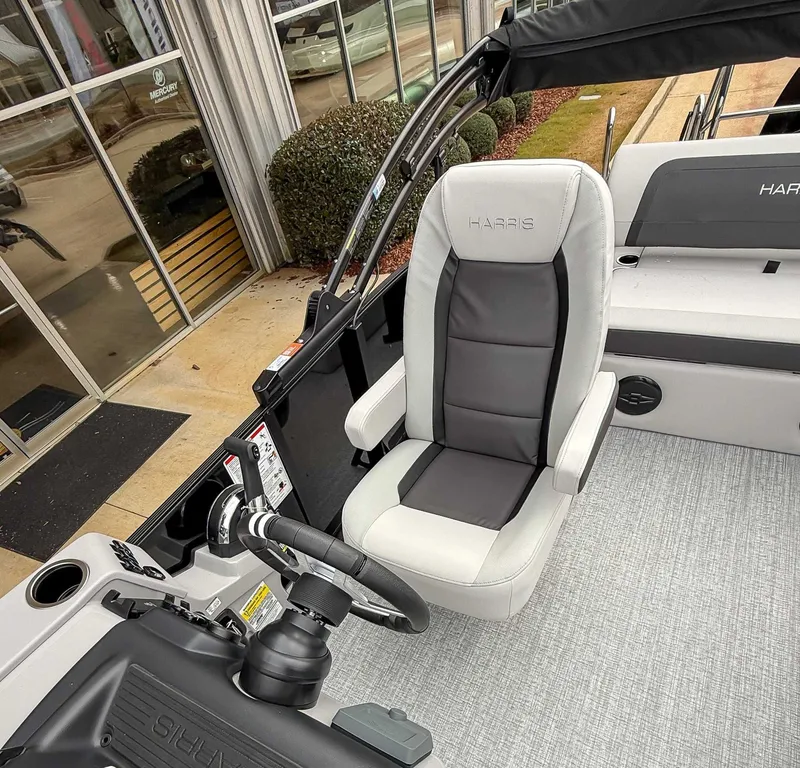 Slide: The Image of Interior of 2026 Harris Cruiser 250 SLDH with captain's chair. - 14