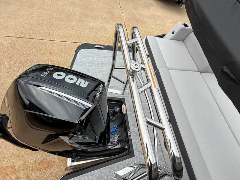 Slide: The Image of Harris Cruiser 250 SLDH 2026 with Mercury engine and gray seating area. - 20