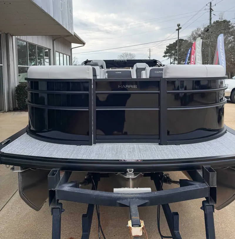 Slide: The Image of Harris Cruiser 250 SLDH 2026 on a trailer outside a building. - 4