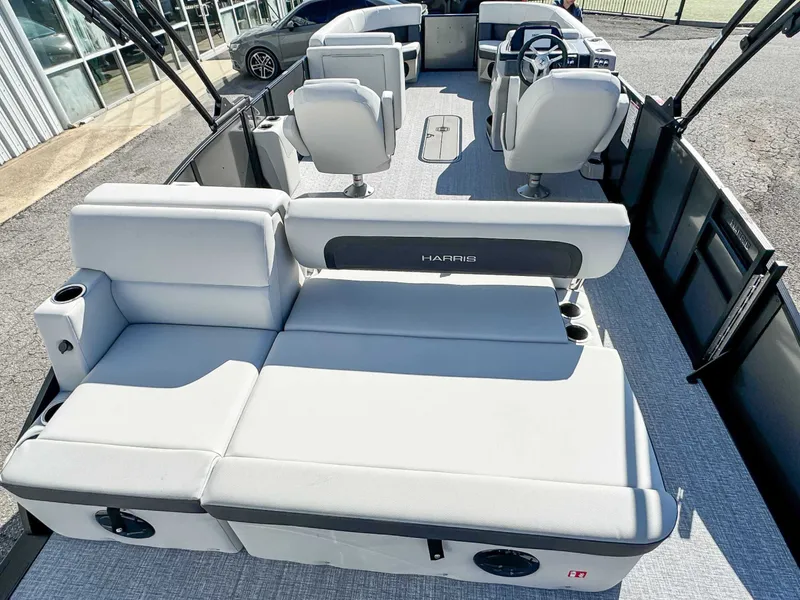 Slide: The Image of Interior of 2026 Harris Cruiser 230 SLDH with luxurious seating. - 10