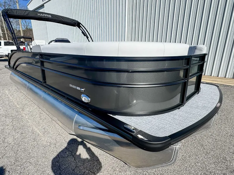 Slide: The Image of 2026 Harris Cruiser 230 SLDH pontoon boat, side view. - 3