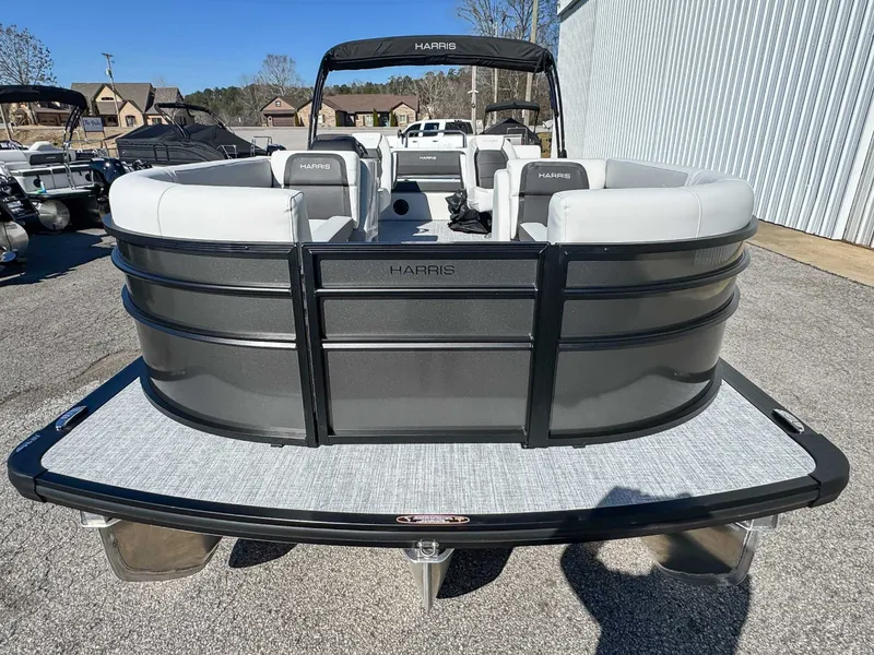 Slide: The Image of 2026 Harris Cruiser 230 SLDH pontoon boat on parking lot. - 4