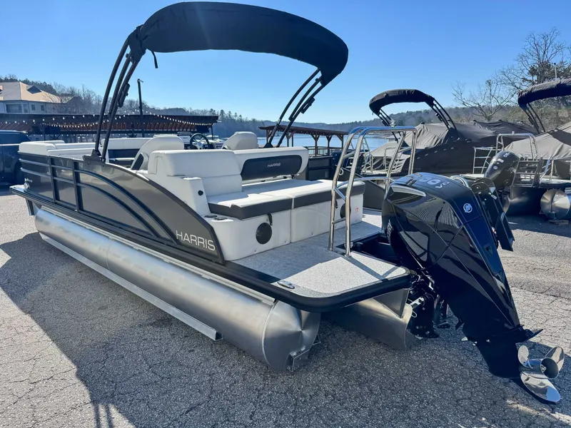 Slide: The Image of 2026 Harris Cruiser 230 SLDH pontoon boat outdoors in sunlight. - 7