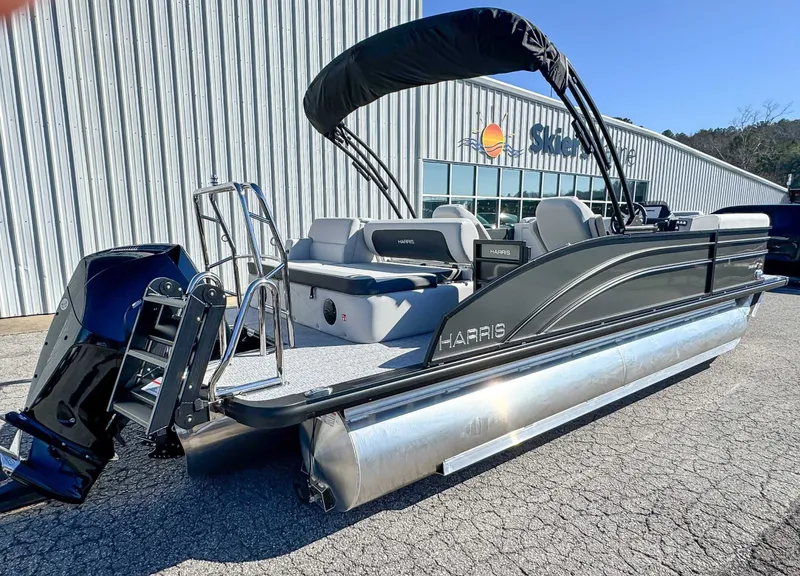 Slide: The Image of Harris Cruiser 230 SLDH 2026 pontoon boat outside a building. - 8