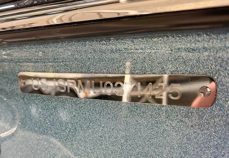 Slide: The Image of Serial number plate on a 2025 Moomba Max boat. - 19