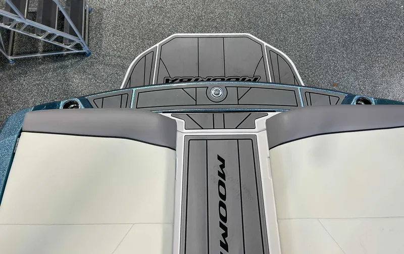 Slide: The Image of Rear view of 2025 Moomba Max boat with gray deck. - 9