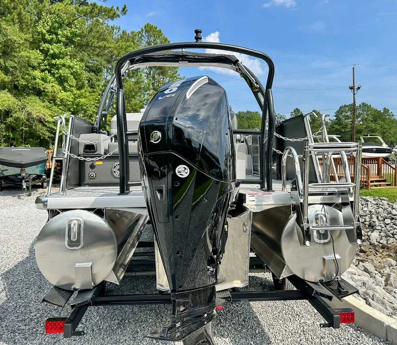 Slide: The Image of Rear view of 2025 Premier 230 Solaris RL boat with outboard motor. - 10