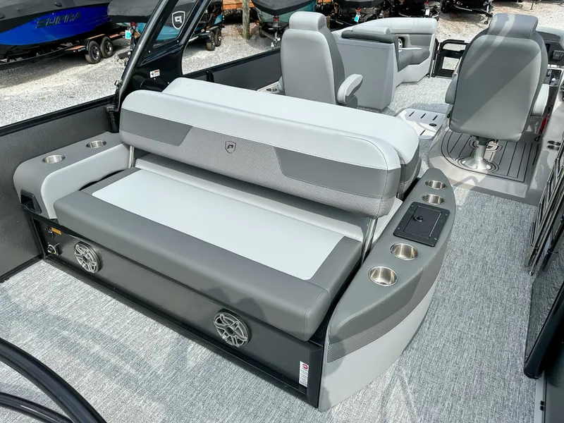 Slide: The Image of Interior of 2025 Premier 230 Solaris RL with gray seating. - 11