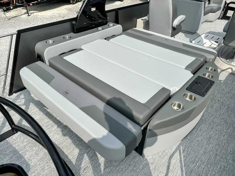 Slide: The Image of 2025 Premier 230 Solaris RL boat with gray cushioned seating. - 13