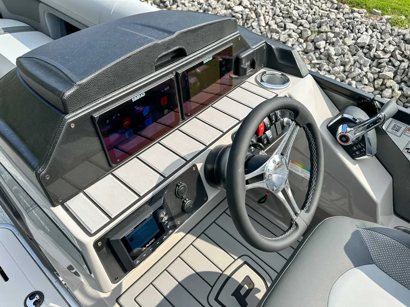 Slide: The Image of Dashboard of 2025 Premier 230 Solaris RL with modern controls. - 24