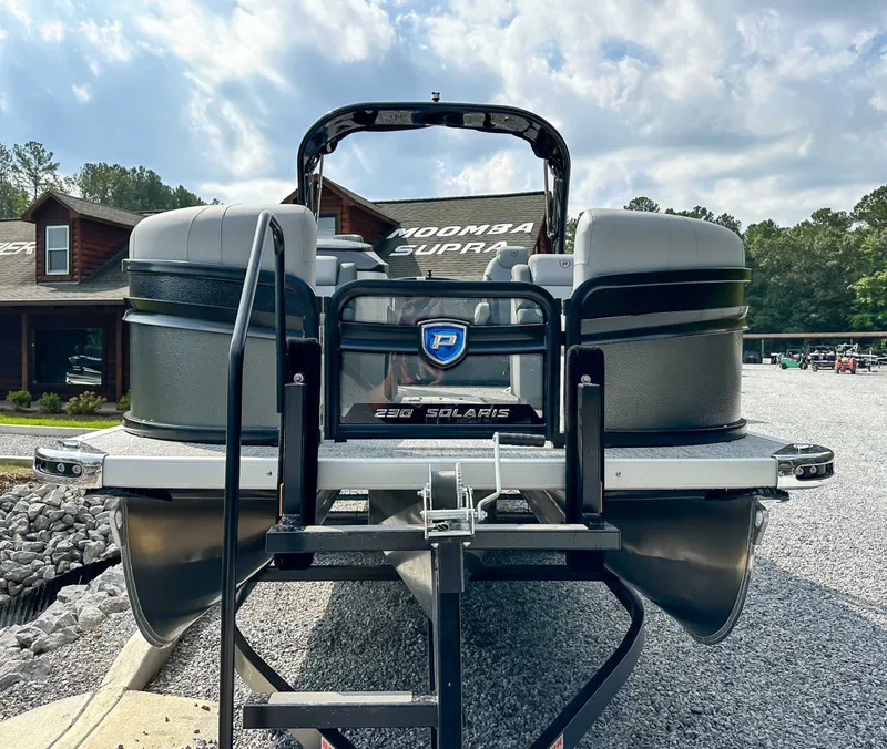Slide: The Image of 2025 Premier 230 Solaris RL pontoon boat on trailer. - 4
