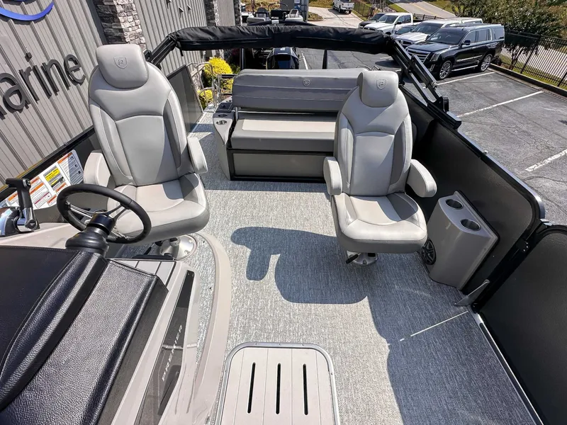 Slide: The Image of Interior of 2025 Premier 230 Sunsation RL with gray seating. - 10
