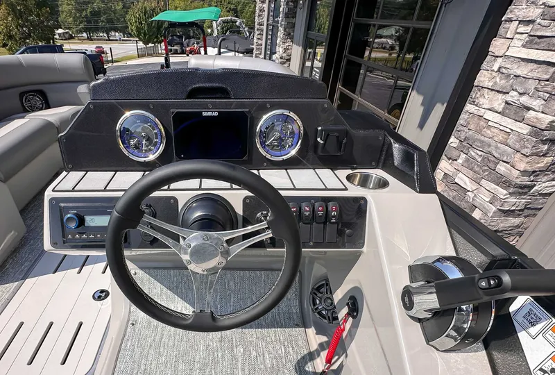 Slide: The Image of 2025 Premier 230 Sunsation RL (PTX 28) steering console. - 12