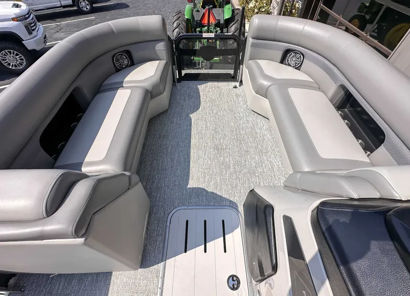 Slide: The Image of Interior of 2025 Premier 230 Sunsation RL with gray leather seating. - 8