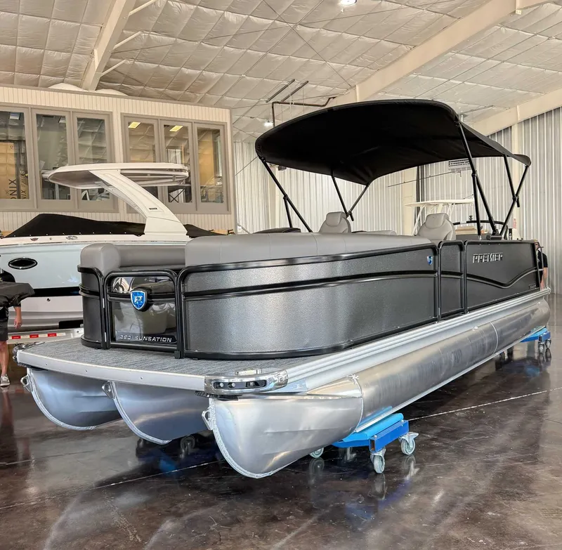 Slide: The Image of 2025 Premier 250 Sunsation RL pontoon boat in a showroom. - 3
