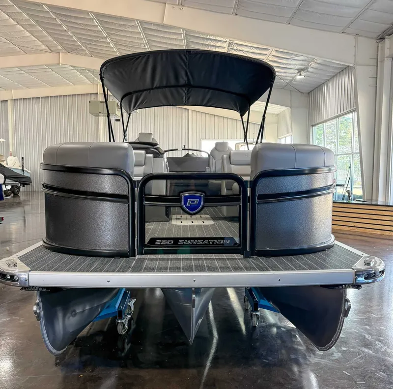 Slide: The Image of 2025 Premier 250 Sunsation RL pontoon boat in a showroom. - 4