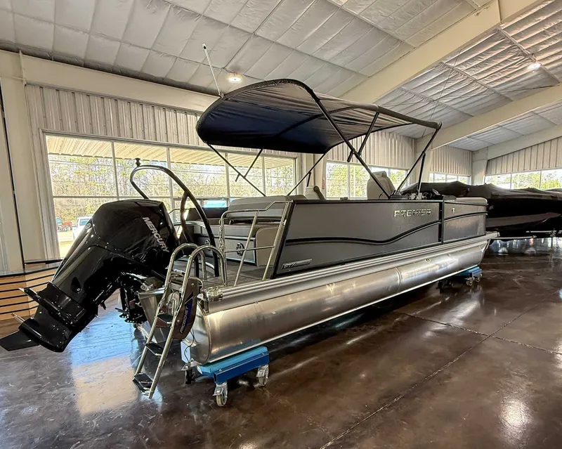 Slide: The Image of 2025 Premier 250 Sunsation RL pontoon boat in a showroom. - 7
