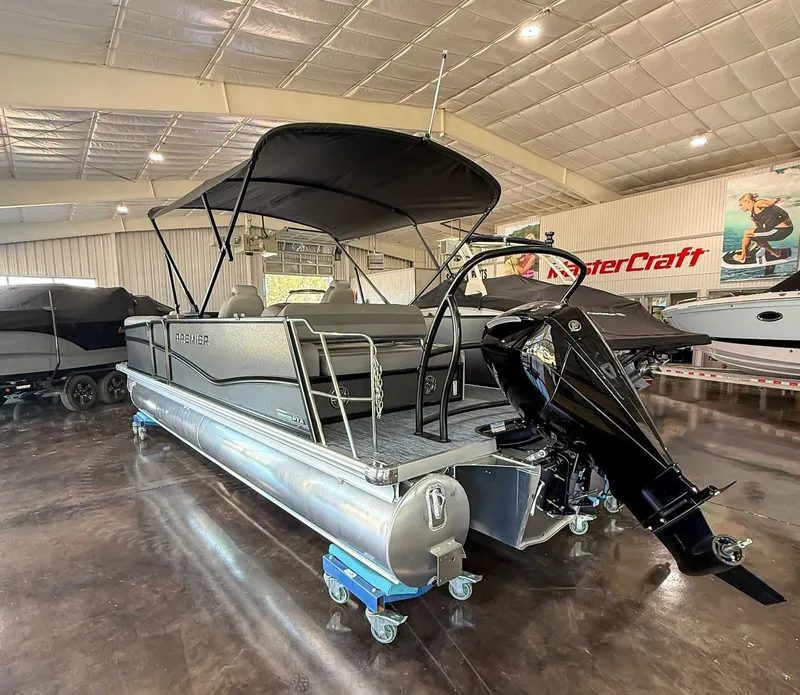 Slide: The Image of 2025 Premier 250 Sunsation RL pontoon boat in a showroom. - 8
