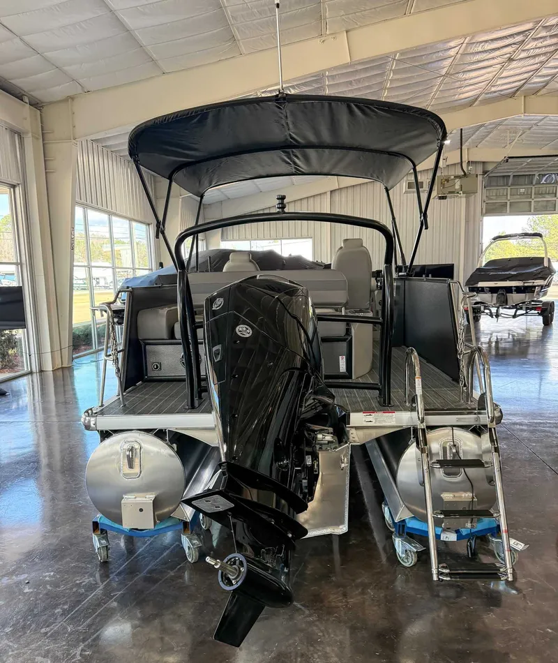 Slide: The Image of 2025 Premier 250 Sunsation RL boat in showroom. - 9