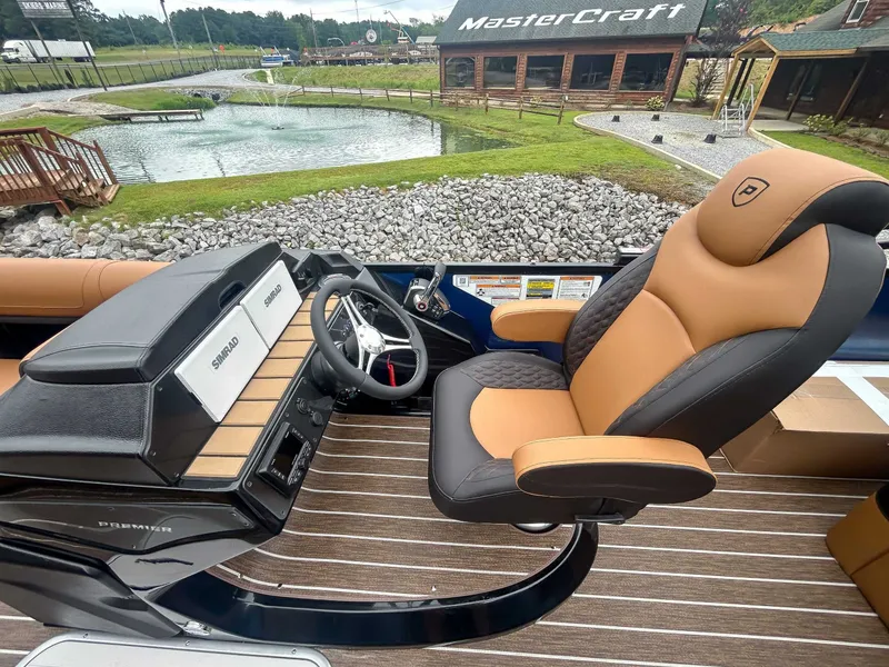 Slide: The Image of Interior of Premier Solaris 230 RL (28 PTX) 2026 with luxurious captain's chair. - 13