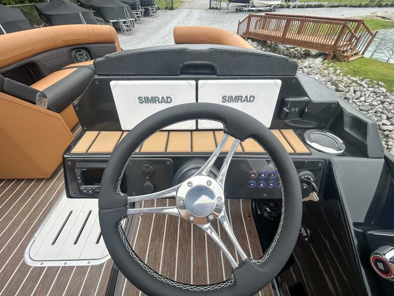 Slide: The Image of Cockpit of 2026 Premier Solaris 230 RL with Simrad system. - 14
