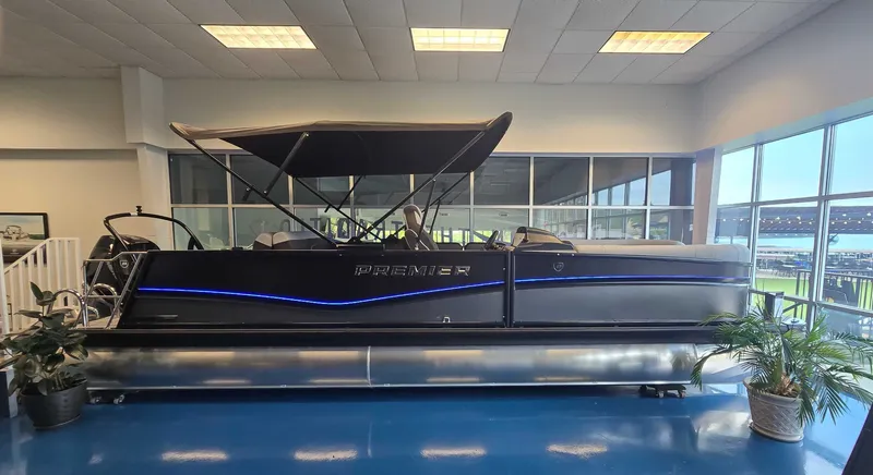 The Image of 2026 Premier Solaris 250 RL pontoon boat in showroom. - 1