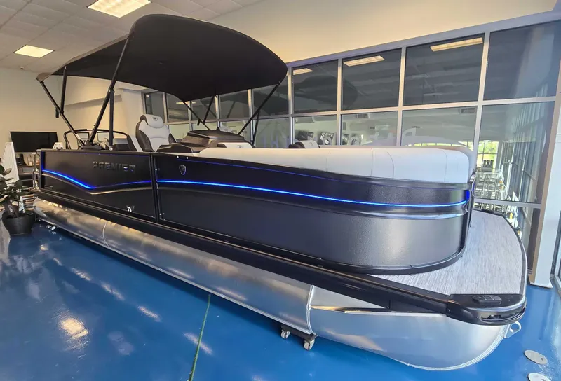 Slide: The Image of 2026 Premier Solaris 250 RL pontoon boat in showroom. - 4
