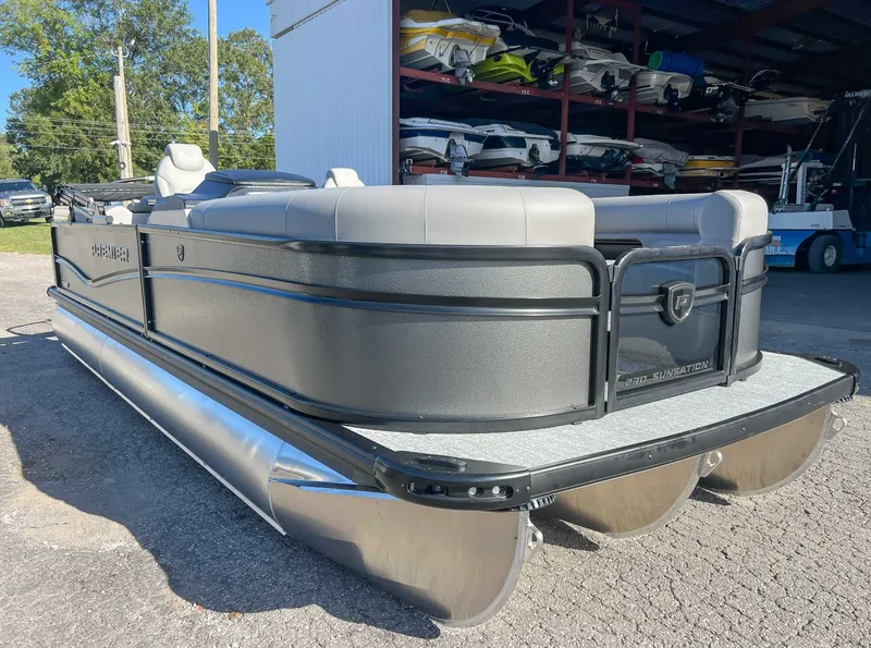Slide: The Image of 2026 Premier Sunsation 230 RF pontoon boat on parking lot. - 5