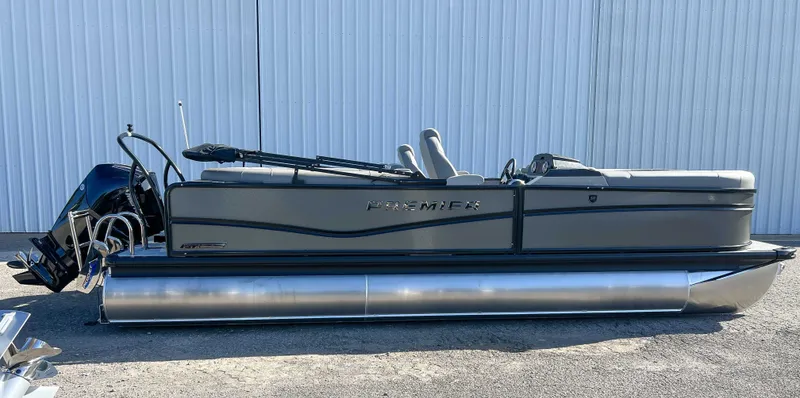 Slide: The Image of 2026 Premier Sunsation 230 RF pontoon boat in front of warehouse. - 6