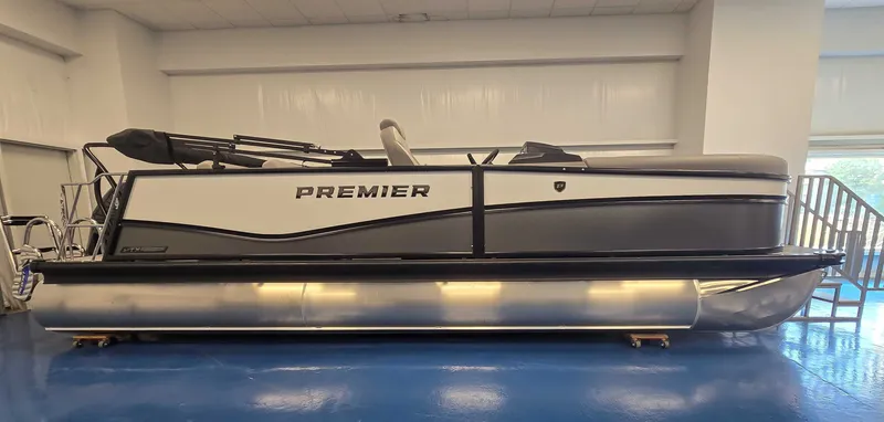 The Image of 2026 Premier Sunsation 230 RL pontoon boat in showroom. - 1