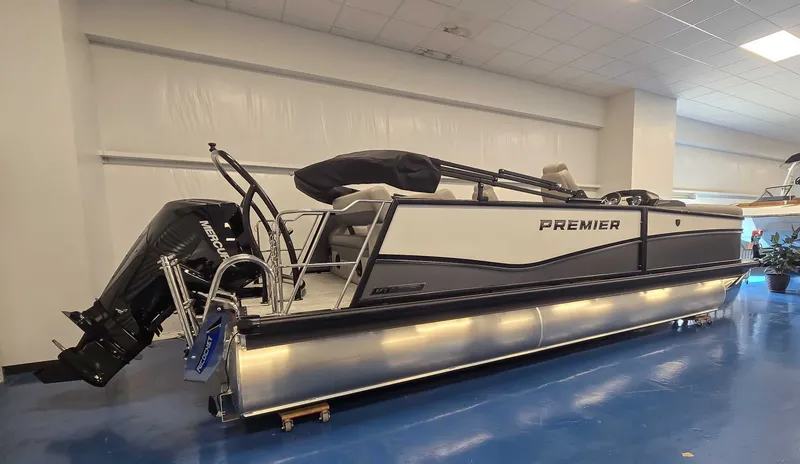 Slide: The Image of 2026 Premier Sunsation 230 RL pontoon boat in showroom. - 4