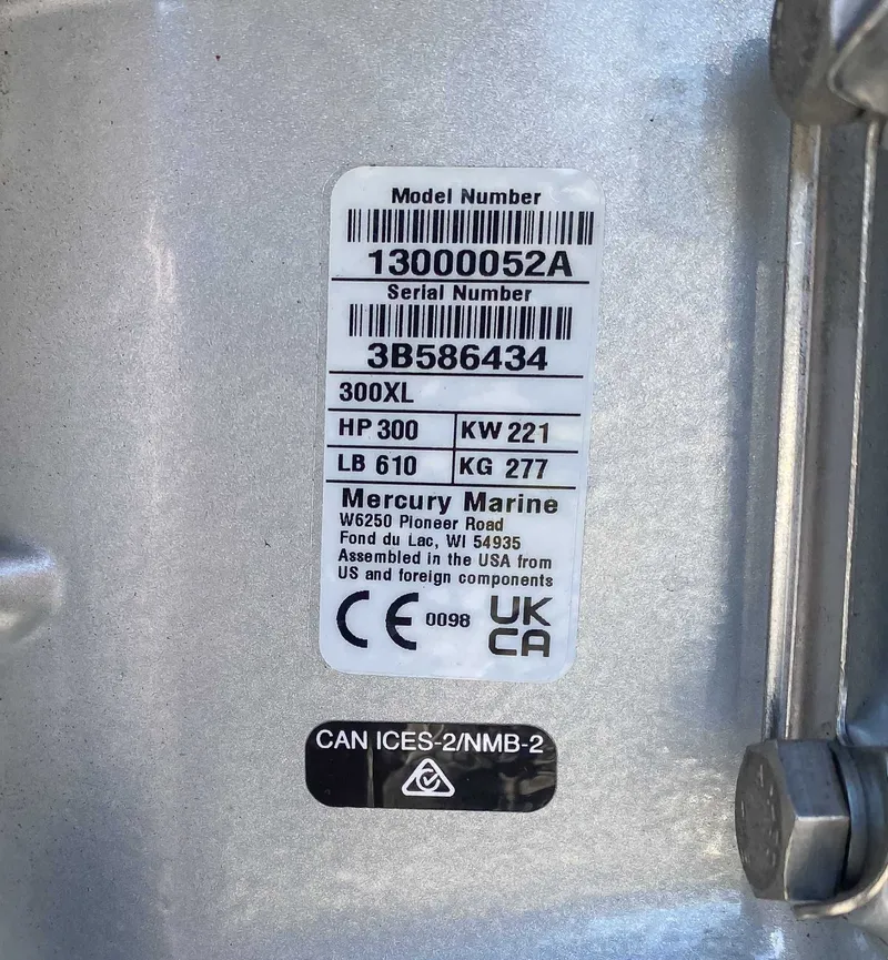 Slide: The Image of Label on Mercury Marine engine, model number 13000052A, serial number 3B586434. - 21