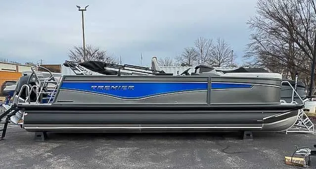 The Image of 2026 Premier Intrigue 230 RL pontoon boat with blue accent. - 1