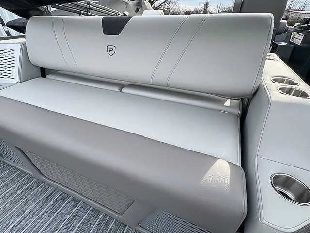 Slide: The Image of Luxurious seating in Premier Intrigue 230 RL pontoon boat, 2026 model. - 15