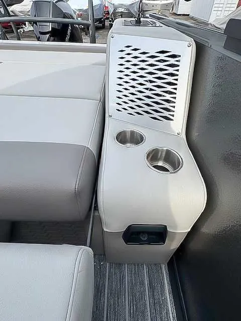 Slide: The Image of Interior of 2026 Premier Intrigue 230 RL with cup holders. - 16