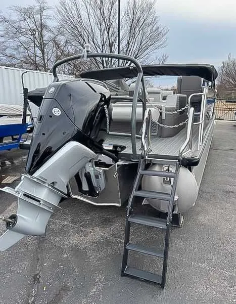Slide: The Image of 2026 Premier Intrigue 230 RL pontoon boat with outboard motor. - 6